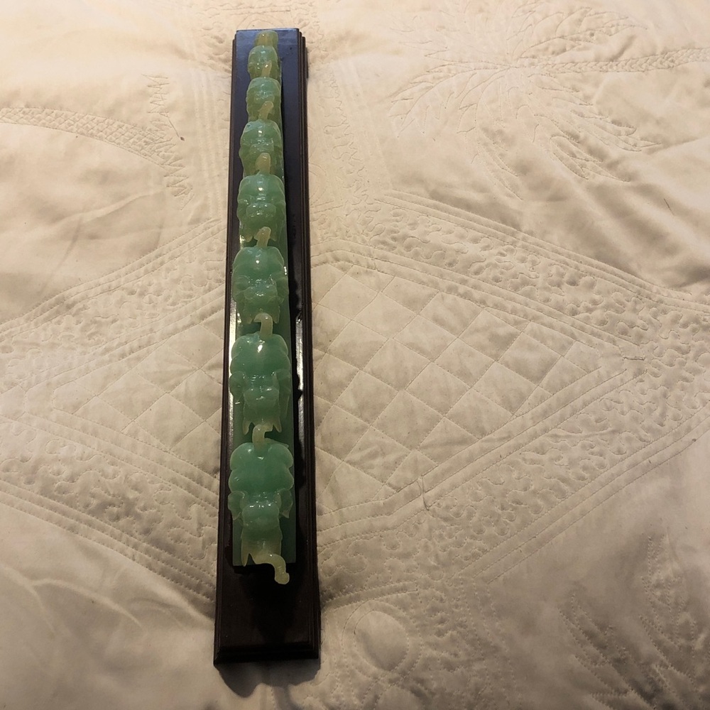 Green Jade-like Linked Figurine Display